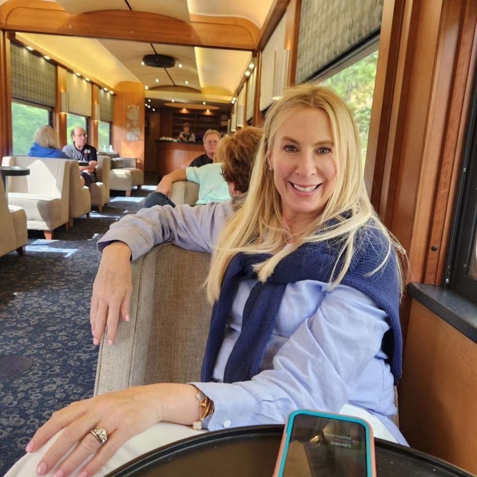 Woman posing in the train.