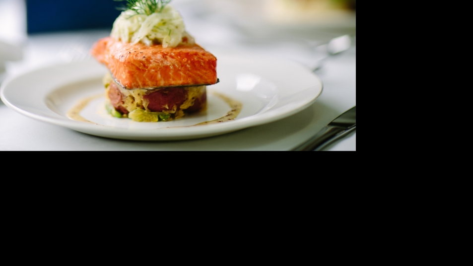 Rocky Mountaineer’s salmon with shaved fennel slaw, local-market vegetables and mustard vinaigrette.