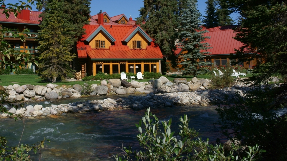 The idyllic Post Hotel & Spa situated along the Pipestone River in Lake Louise. Image: Courtesy of Post Hotel & Spa