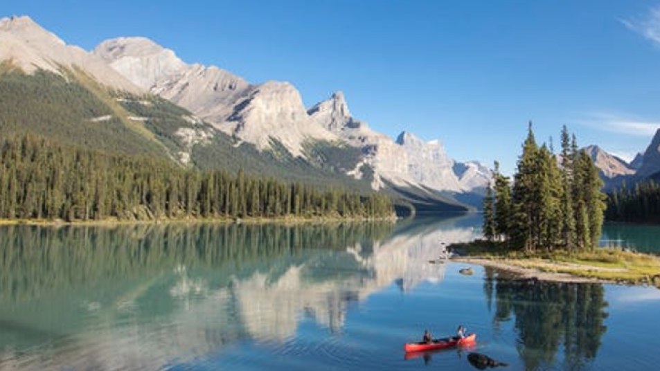 Immerse yourself in Jasper National Park by taking a nature walk or canoeing on Maligne Lake.