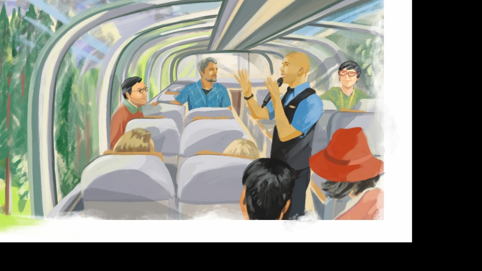 A Host shares stories with guests onboard a GoldLeaf Service rail coach.