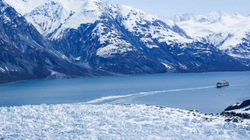A cruise ship navigates the scenic Inside Passage route.