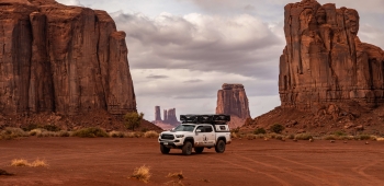 Photo of Moab Overlander Vehicle in front of red rocks