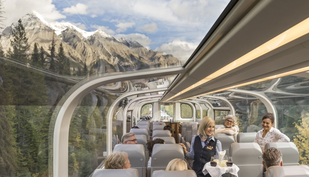 Bi-level glass-dome coach for Rocky Mountaineer's Goldleaf Service Level.