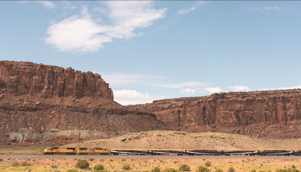 Rocky Mountaineer by a canyon