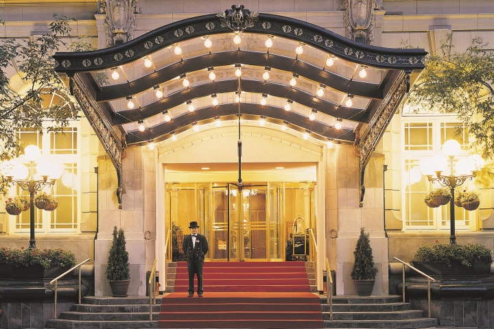 fairmont palliser in calgary entrance lit up at night