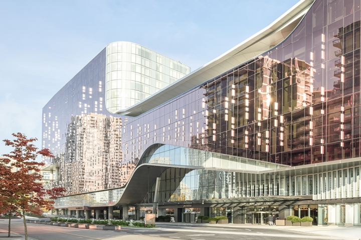 outdoor view of marriot parq vancouver, with city reflecting on building