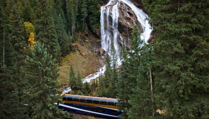 rocky mountaineer train passes by pyramid falls on the journey through the clouds route on the way to jasper