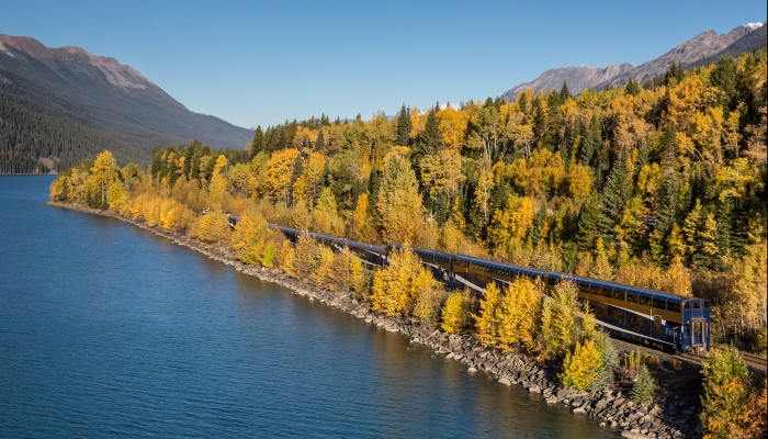 rocky mountaineer train goes by lake along the journey through clouds route to jasper