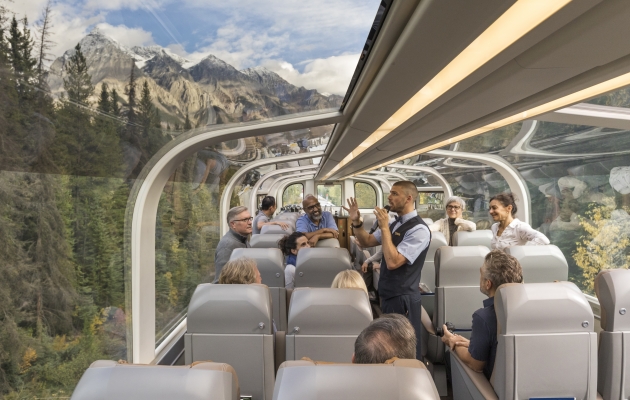 Rocky Mountaineer host tells story to guests